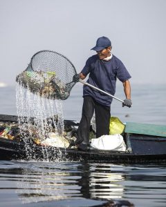 plastic wastes being removed from the ocean