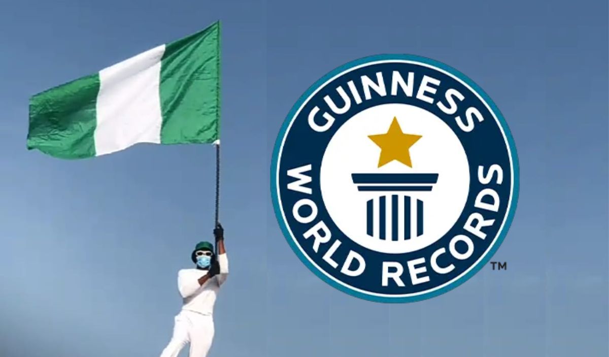 Nigerian Flagboy John Eze begins the Longest Hand-flown National Flag Marathon in Lagos