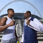 Anthony Joshua and Daniel Dubois pose outside Wembley stadium
