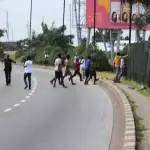 Lagos Police Watch As Hoodlums Attack Protesters, Chase Journalists At Ojota